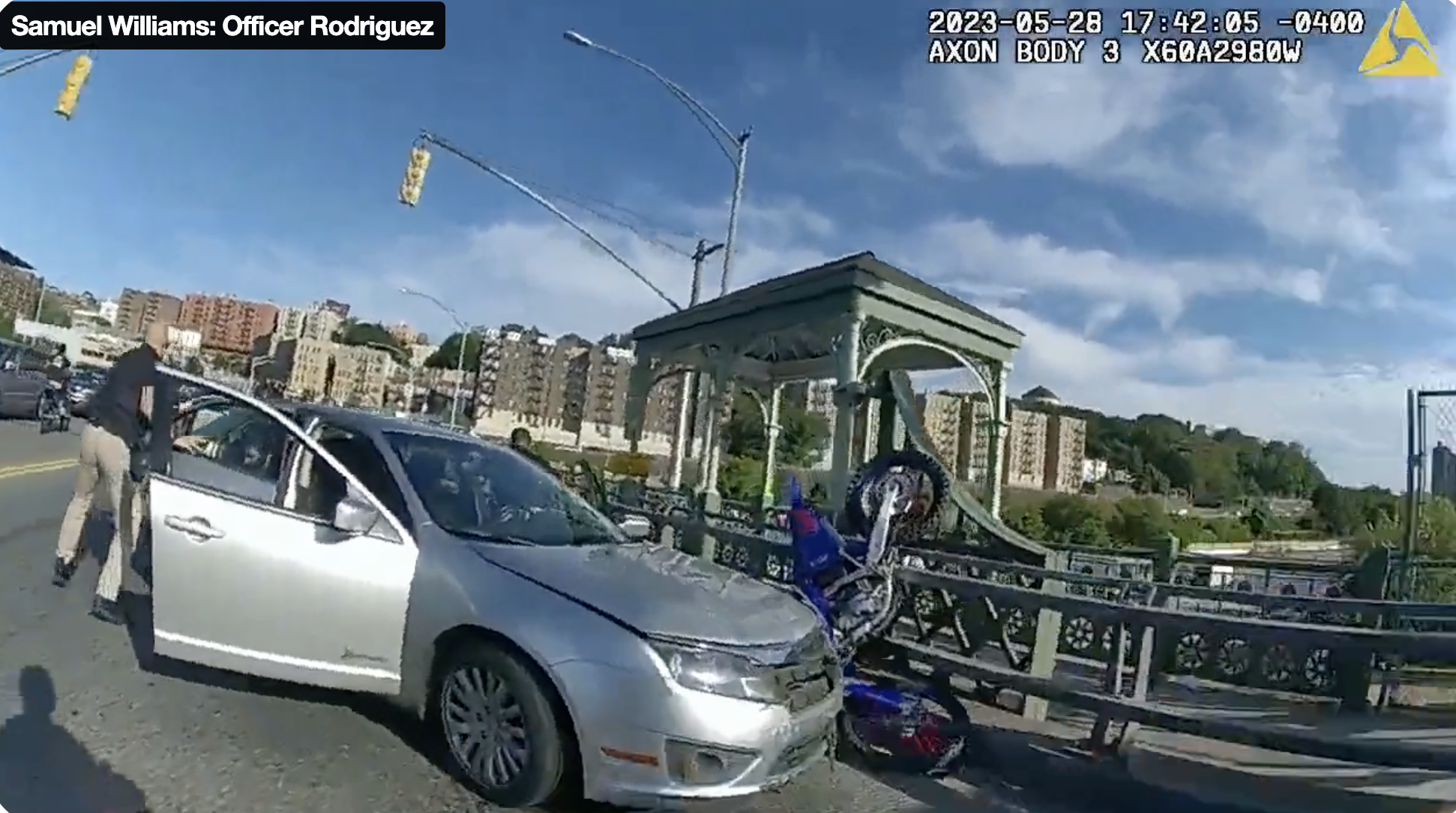 Body cam footage showed Samuel Williams's dirt bike overturned and nearly pinned to a guard rail by an unmarked police car in 2023.